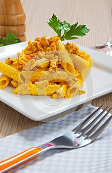 Penne with speck and saffron