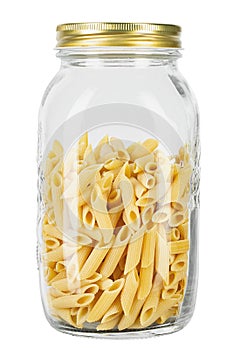 Pennette rigate. Raw pasta in a glass jar for storing bulk products. isolated on white background