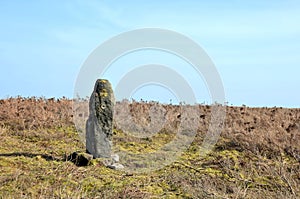 Pennine landscape with large ancient standing stone on midgley moor in west yorkshire