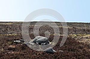 Pennine moorland landscape with large old boulders and stones on midgley moor in west yorkshire