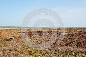 Pennine moorland landscape with large old boulders and stones on midgley moor in west yorkshire