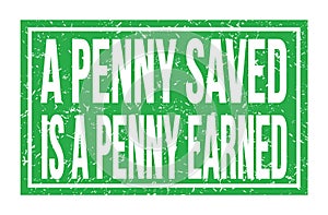 A PENNY SAVED IS A PENNY EARNED, words on green rectangle stamp sign