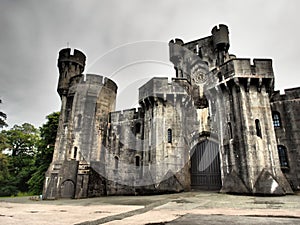 Penrhyn Castle is a country house in Llandygai, Bangor, Gwynedd, North Wales, in the form of a Norman castle photo