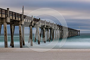 The Pensacola Beach pier in the morning looking out on the Gulf of Mexico photo