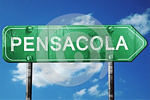 Pensacola road sign , worn and damaged look