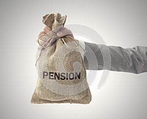 Pension money bag with business man holding up