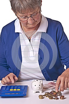 Pensioner counting money photo