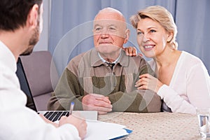 Pensioner and daughter with social employee