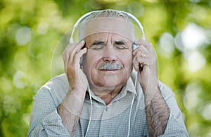 Pensioner enjoying his music