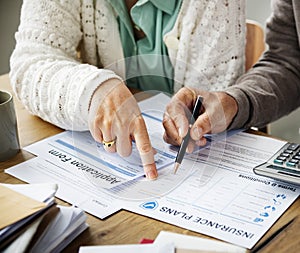 Pensioner filling out a form