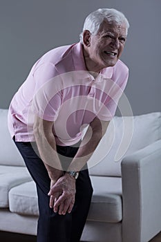 Pensioner having knee arthritis