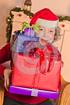 Pensioner Santa Claus hat gift boxes