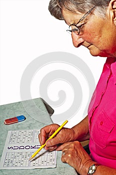 Pensioner with sudoku