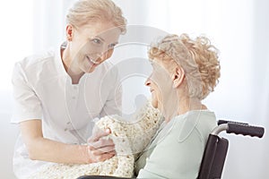 Pensioner on wheelchair sick on osteoporosis