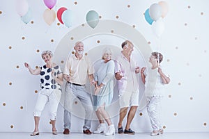 Pensioners dancing at party