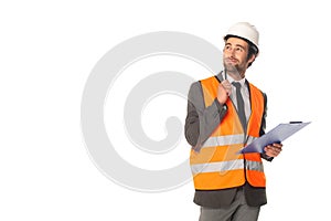 Pensive architect holding clipboard isolated on