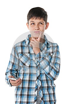 Pensive boy with a cell phone