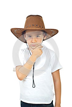 Pensive boy in cowboy hat