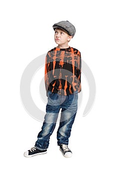 Pensive boy wearing a cap.