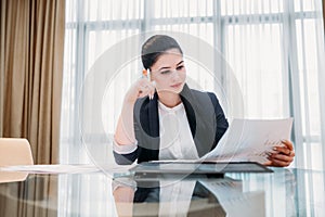 Pensive business woman read document office