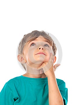 Pensive child looking up