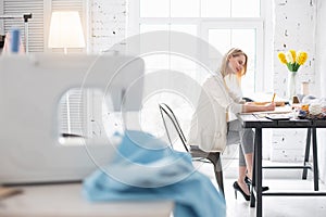 Pensive concentrated craftswoman developing new idea