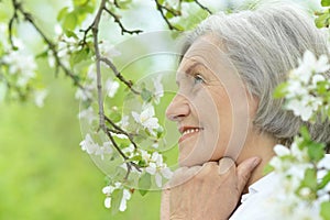 Pensive elderly woman