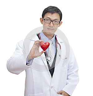 Pensive experienced profaser asian doctor while looking and smile hand holding  red heart. General practitioner concept isolated