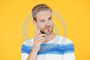 Pensive face. Find solution. Thoughtful man on yellow background. Hipster bearded face not sure in something. Hard