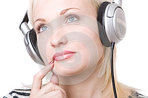 A pensive girl in headphones