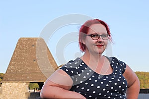 Pensive girl with red hair at Möhnesee