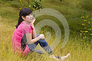 A pensive girl with weeds