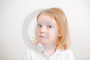 Pensive girl in white shirt