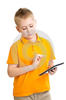 Pensive kid boy with tablet pc or phablet isolated photo