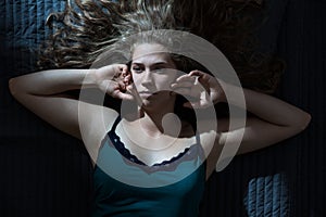 Pensive lady during sleepless night