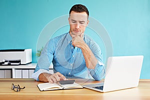 Pensive man in office