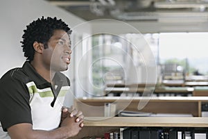 Pensive man sitting in office