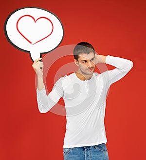 Pensive man with text bubble and heart in it