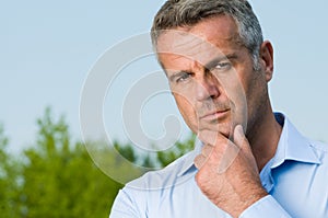 Pensive mature businessman