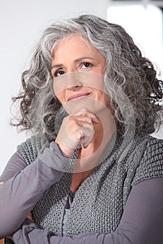 Pensive middle-aged woman
