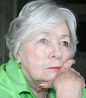 Pensive Older Woman in Color photo