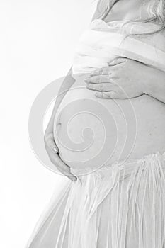Pensive pregnant woman dreaming about child. Happiness concept,