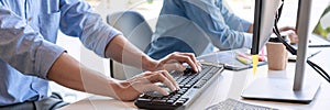 Pensive programmer working on on desktop pc programming code technologies or website design at office Software Development Company