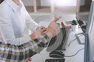 Pensive programmer working on desktop pc programming code technologies or website design at office Software Development Company