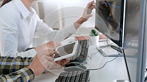 Pensive programmer working on desktop pc programming code technologies or website design at office Software Development Company