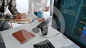 Pensive programmer working on desktop pc programming code technologies or website design at office Software Development Company