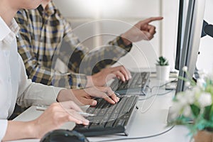 Pensive programmer working on desktop pc programming code technologies or website design at office Software Development Company