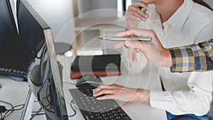 Pensive programmer working on desktop pc programming code technologies or website design at office Software Development Company