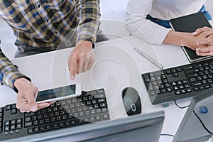 Pensive programmer working on desktop pc programming code technologies or website design at office Software Development Company