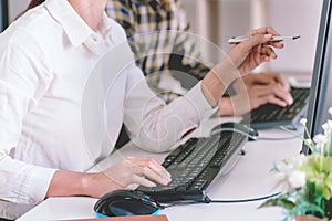 Pensive programmer working on desktop pc programming code technologies or website design at office Software Development Company